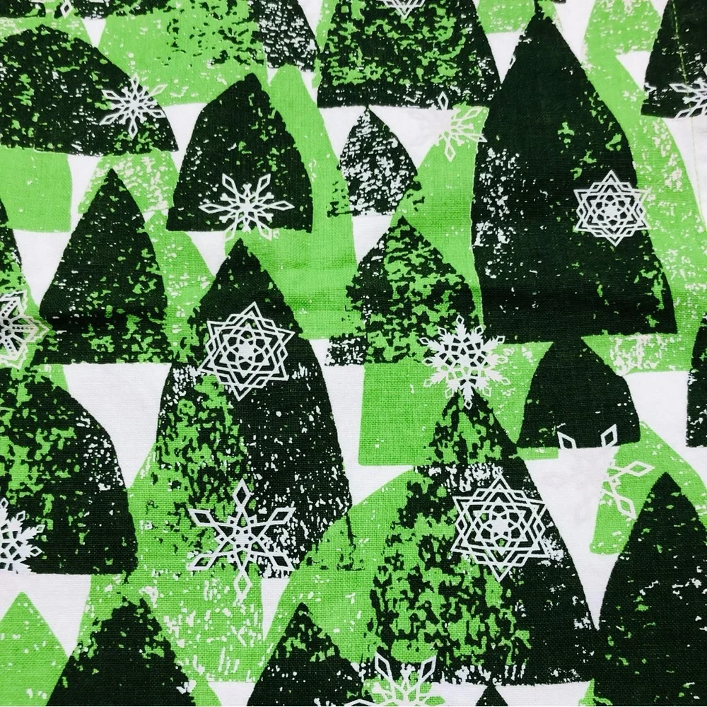 Crate & Barrel Snowy Forest, Shades of green on white Table Runner, 24”x90”.